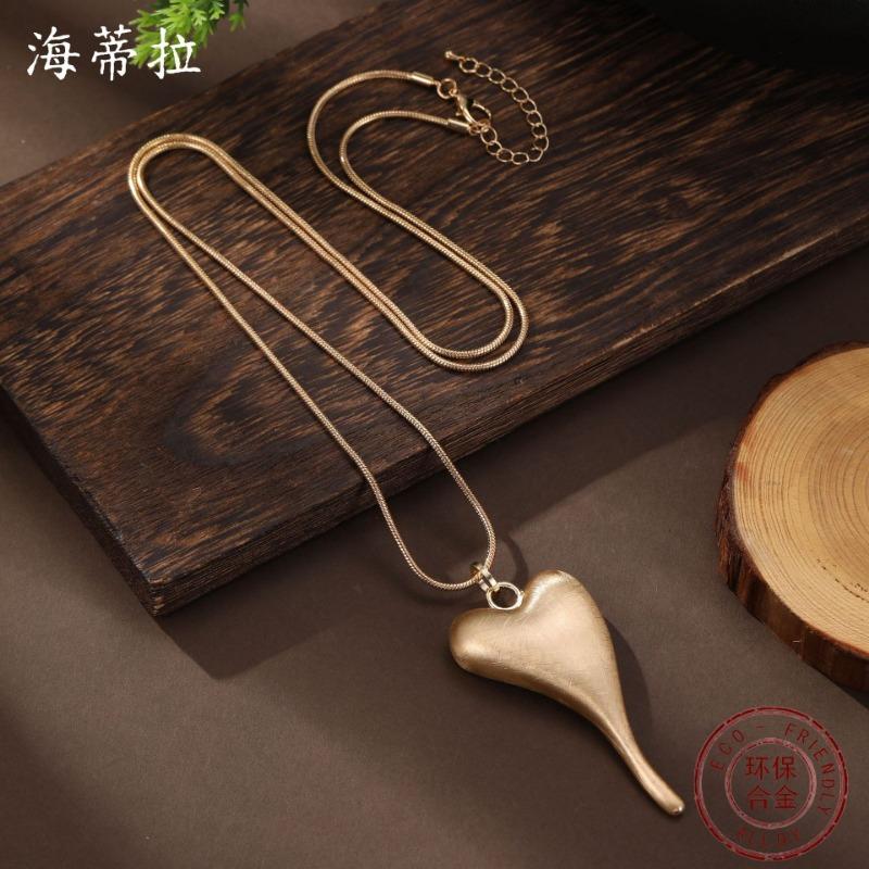 New brushed love snake bone chain long pendant women's simple high-end heart-shaped versatile long necklace