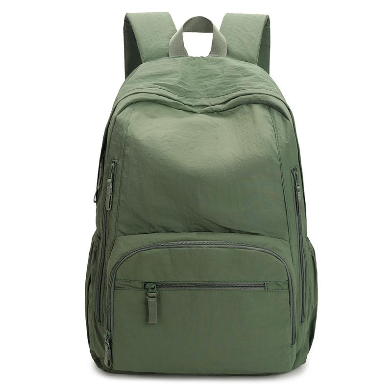 Ryggsäck i enfärgat dam lätt utomhusryggsäck stor kapacitet student skolväska