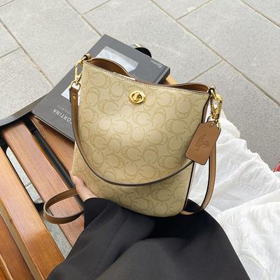 Nouveau sac seau simple portable à bandoulière oblique simple polyvalent pour femme