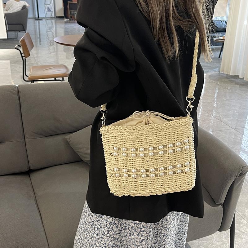 2025 Fashion Niche Pearl Straw Underarm Bags Women New Versatile Temperament Commute Crossbody Bags Vacation Style Beach Bags