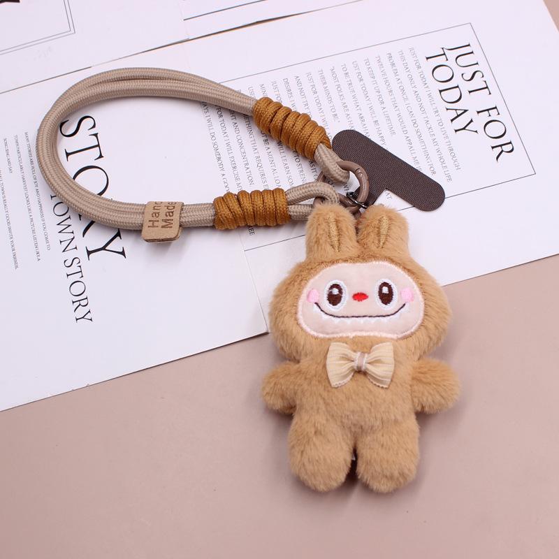 Puppenanhänger, Rucksackanhänger, Damenhandtaschenanhänger, Handyhüllenanhänger.