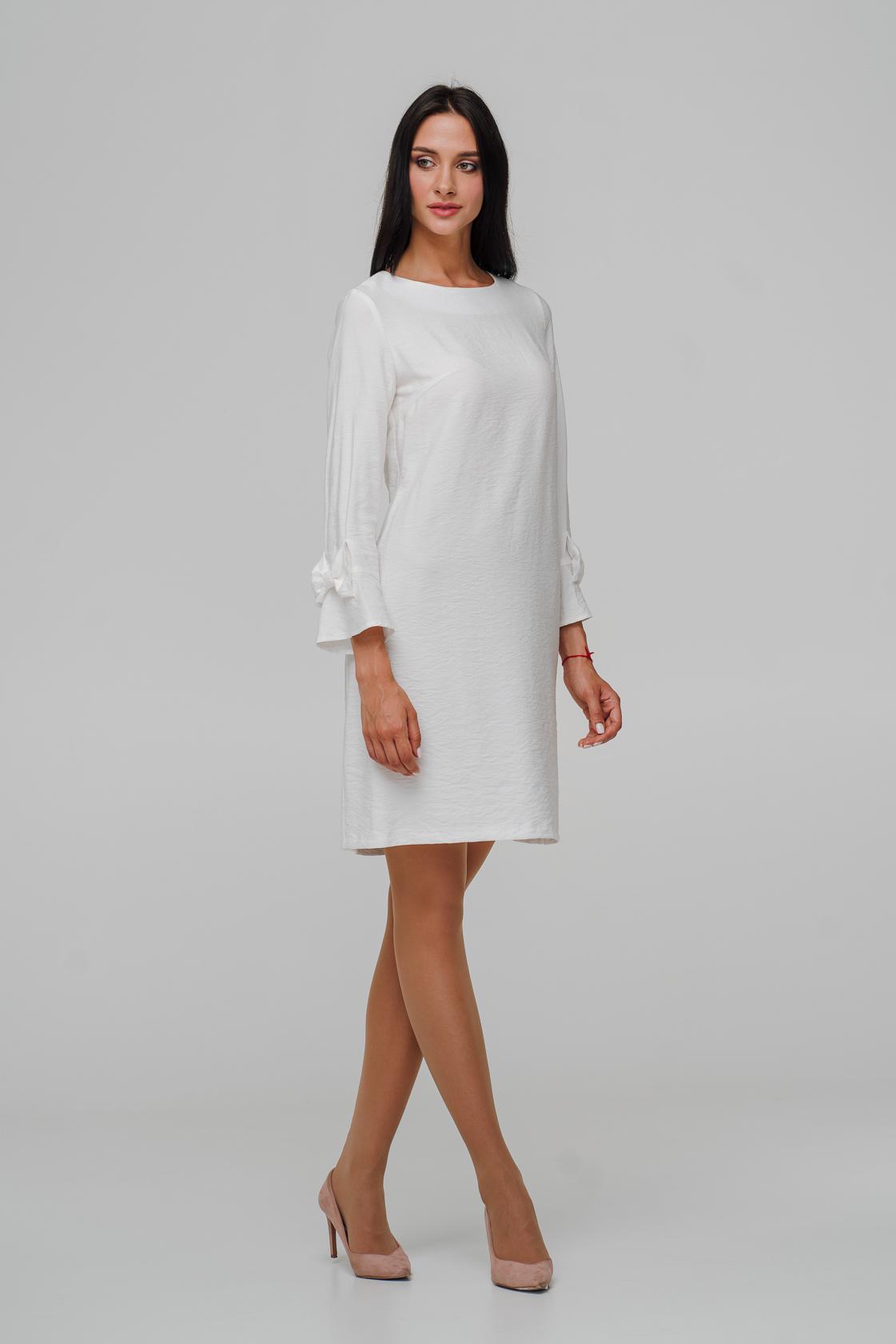 

Легка сукня з бантами на рукавах. 40 білий