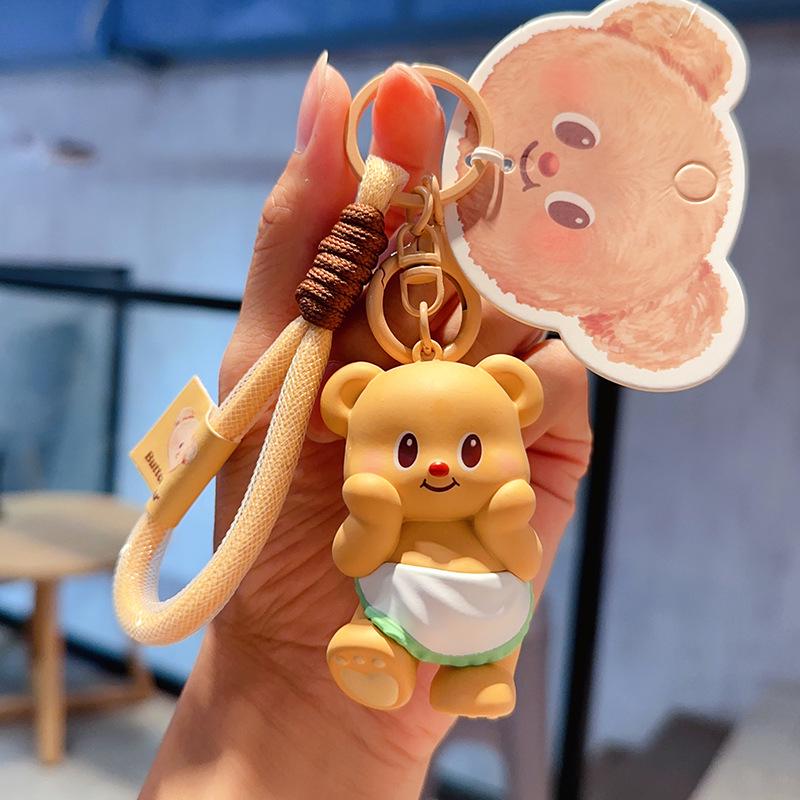 

Брелок у формі милого ведмедика-труби - креативний подарунок-підвіска для пар Butter Bear Acting Cute