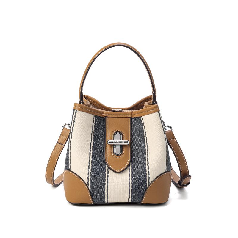 Fashion handheld women's bags, niche contrasting color canvas bags, high-end sense, large-capacity shoulder crossbody bucket bags