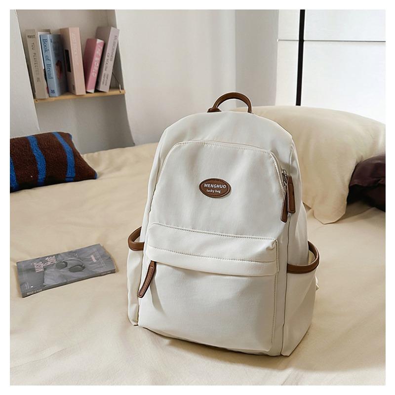 Fresh and sweet candy color backpack for junior high school students, solid color, simple and large-capacity backpack.