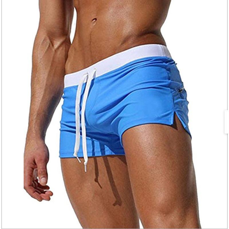 Men's solid color sexy and fashionable back pocket design, beach breathable quick-drying pants, boxer beach pants, swimming trunks.