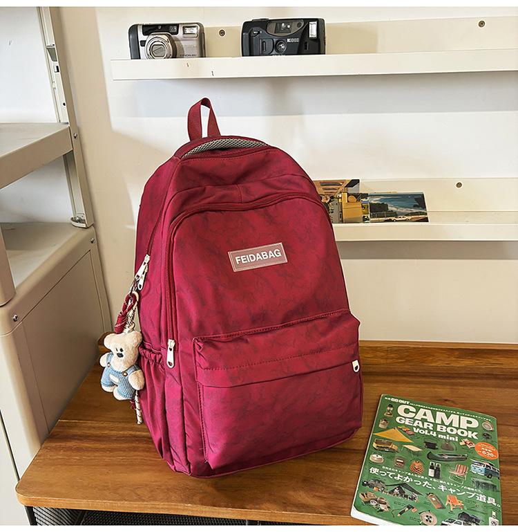 School Bag New Large Capacity Trend Versatile Junior High School Student School Bag Couple Fashion Embossing Simple Casual Lightweight Backpack