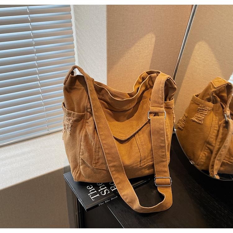 Canvas bag women's large-capacity new summer casual high-end niche lazy wind messenger bag