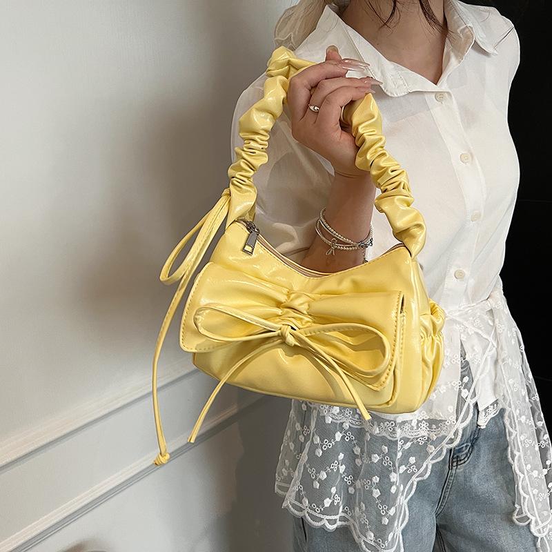 Bag women 2025 new design sense niche fashion messenger bag popular this year pleated armpit small square bag