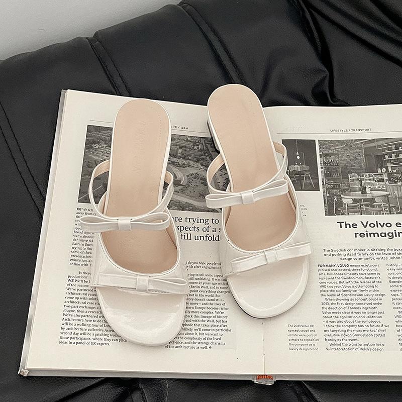 Fashion retro high-heeled cool slippers design sense bow one-word slippers women's summer casual wear French sandals