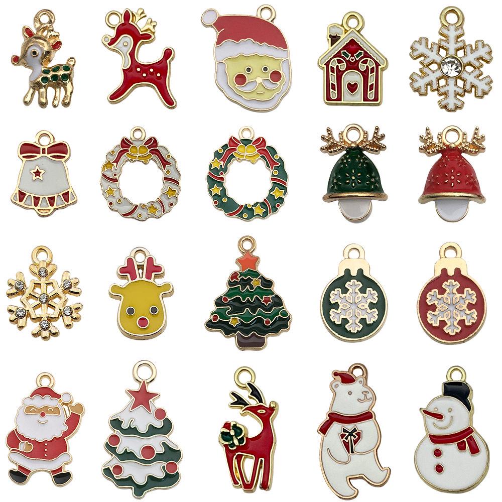 100-teiliges Weihnachts-Tropföl-Legierungs-Schmuckzubehör: Weihnachtsmann, Schneemann, Glocke, Rentier Anhänger für DIY Armbänder.