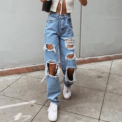 Les jeans pour femmes européennes et américaines avec des trous semblent amincissants, les jeans pour femmes lavés à l'eau, les pantalons longs