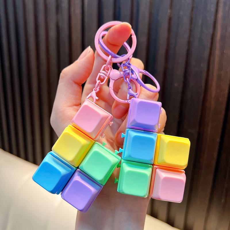 Unzip Mini Macaron Keychain: Creative Finger Press Decompression Keyboard Pendant Toy.