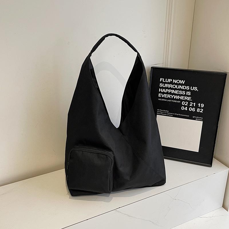 Japanese simple handbag bag women's 2025 new large-capacity niche design casual crossbody bag commuter tote bag