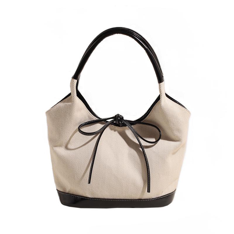 Hand carrying retro casual tote bag women's 2025 new Korean version trendy fashion polka dot underarm bag large capacity women's bag