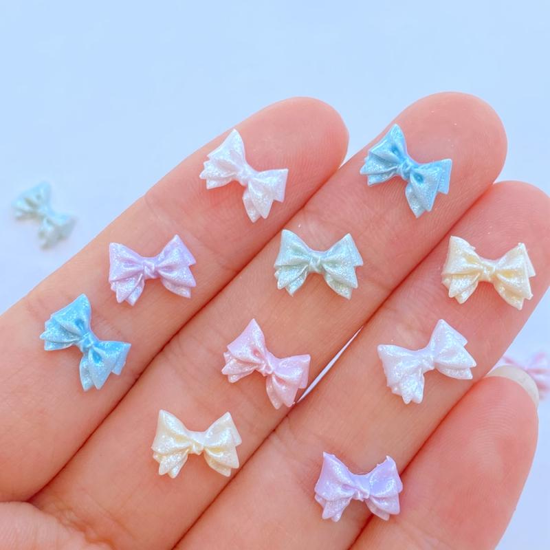 

100Pcs New Cute Mini 7*10mm Small Bowknot Series Resin Flatback Cabochon Scrapbook Kawaii Embellishments Accessories