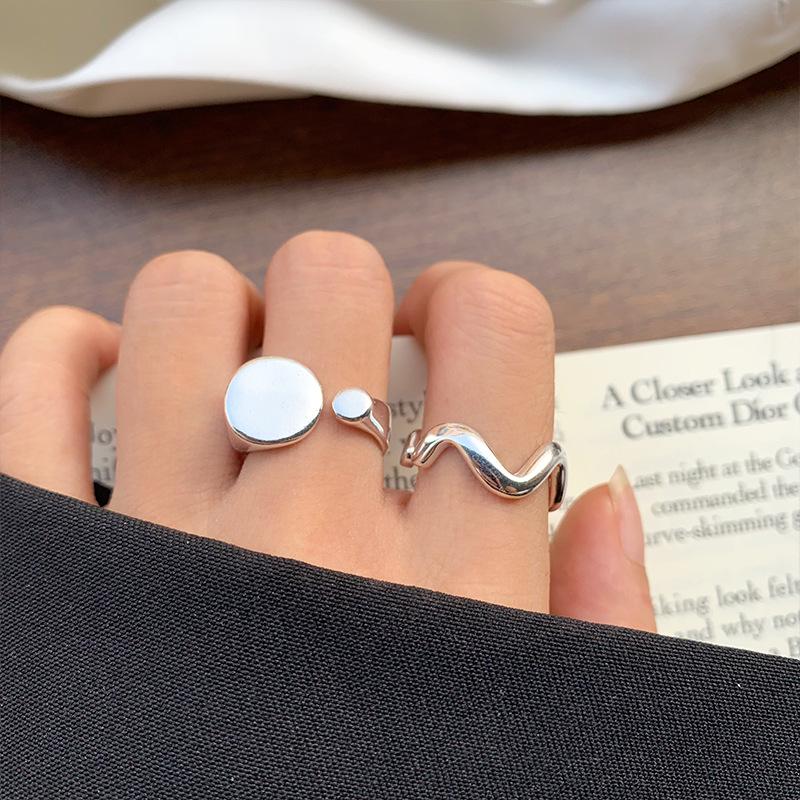 

Lan Zhi Snowflake Wave Pinky Ring: Silver Sterling, Non-Fading, Korean Inspired Design for Women. Adjustable Opening