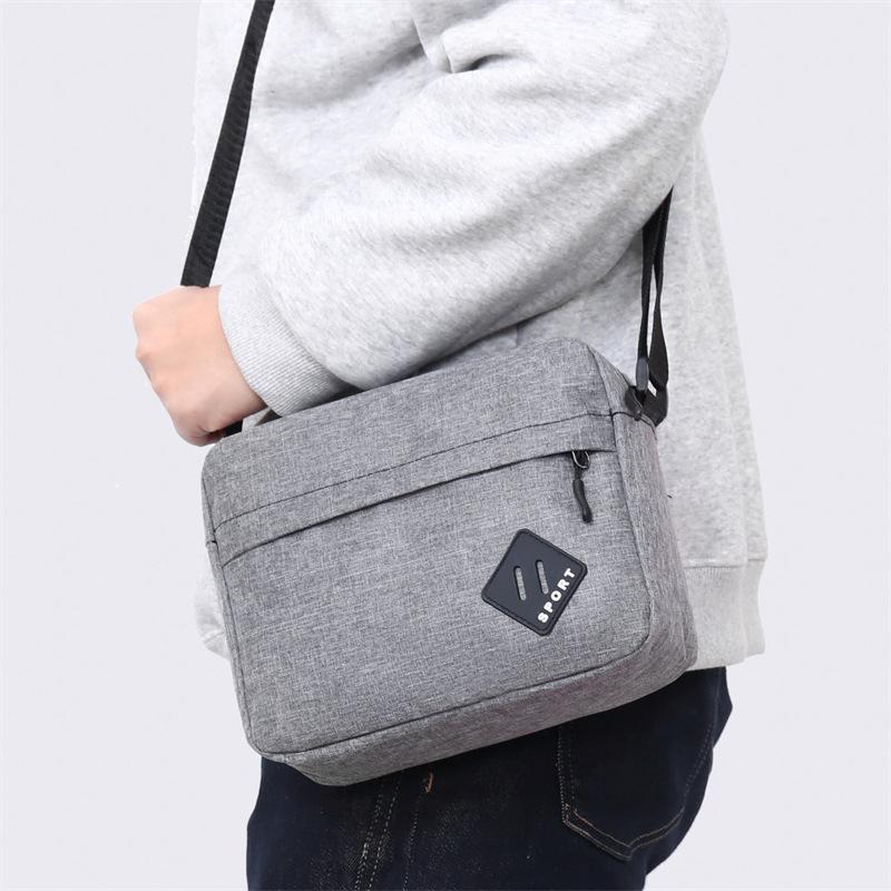 New Lightweight Oxford Cloth Messenger Bag Men's Fashion Simple Shoulder Bag Business Commuting Casual Men's Bag.