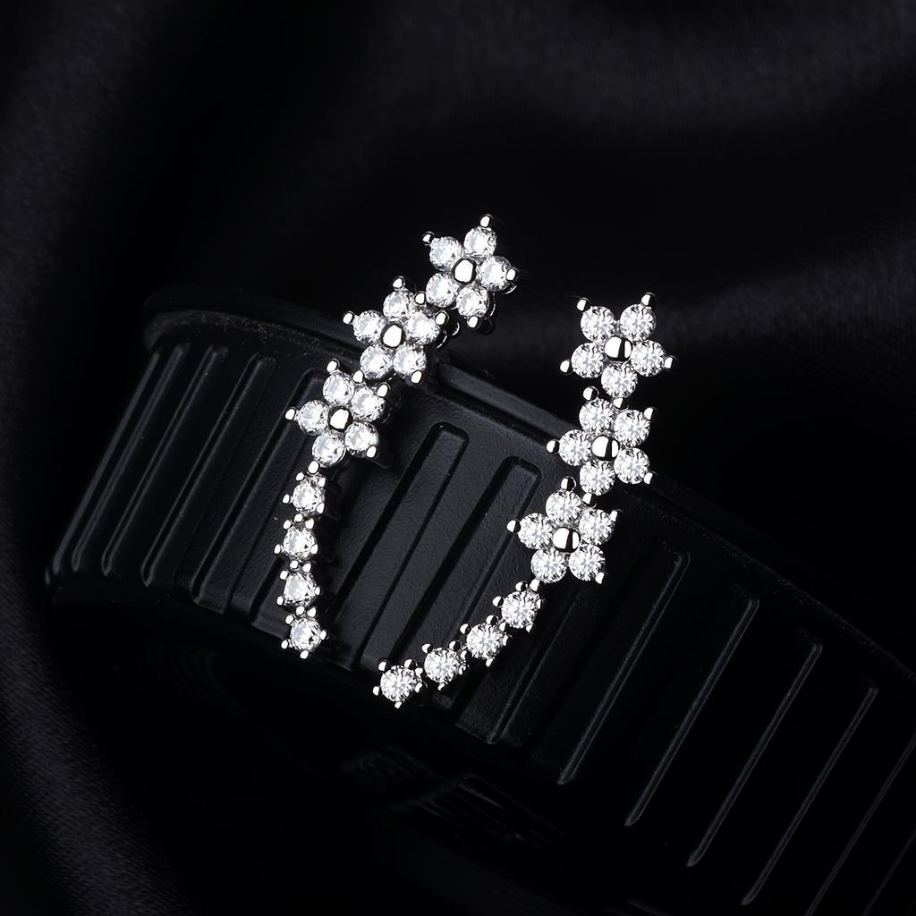 A pair of elegant and luxurious delicate floral stud earrings, fully set with diamonds and rhinestones, perfect as a Thanksgiving gift for women