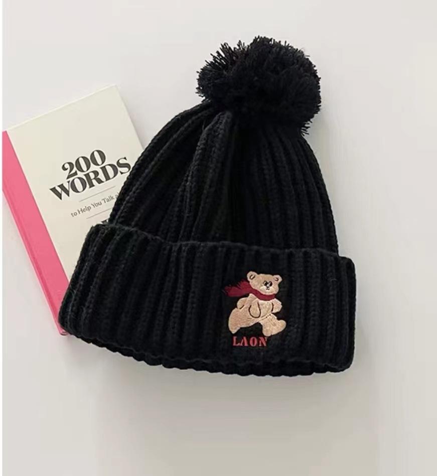 Cute bear embroidered knitted wool hat for children to keep warm in winter, thickened ear protectors, hairball cold hat to show small face