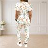 Women Plus Size White Printed Two Piece Set Round Neck Short Sleeve Top Drawstring Cuffed Pants With Pockets