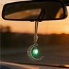 Vehicle Interior Pendant with Silver Tone Finish, Attached Cord, and Glowing Moon Pendant for Car Mirror Area