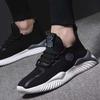 New men's casual shoes breathable sports running shoes soft sole comfortable lightweight flying woven shoes