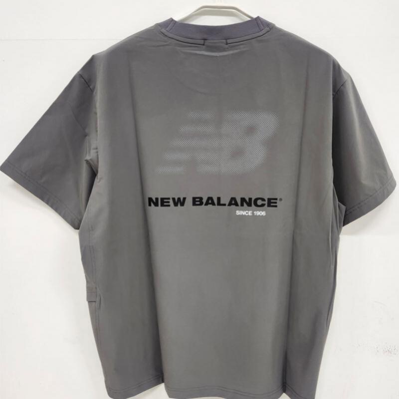 New Balance Men Frozen Essential Woven Tee Charcoal Nbneg31623