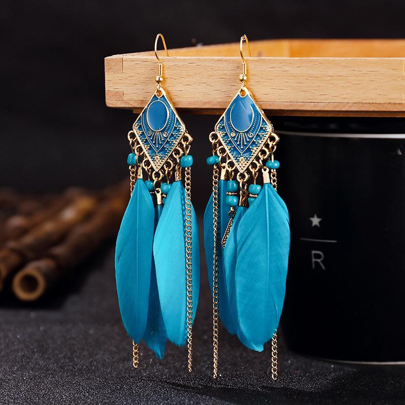 

Fashion Bohemian Long Chain Feather Tassel Earrings For Women Red Blue White Color Geometric Hanging Earrings Pendientes Mujer peacock синього кольору