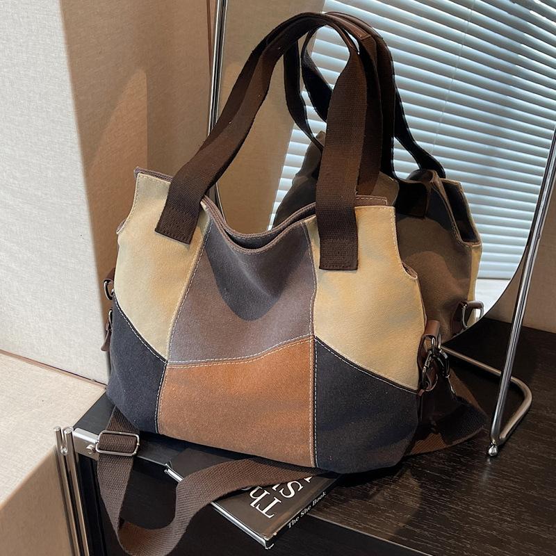 Canvas bag women's bag new Korean version of fashion leisure travel shoulder bag large capacity versatile women's portable messenger bag