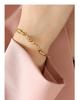 Irregular Inlaid Zircon Titanium Steel Bracelet with 18K Gold Plating
