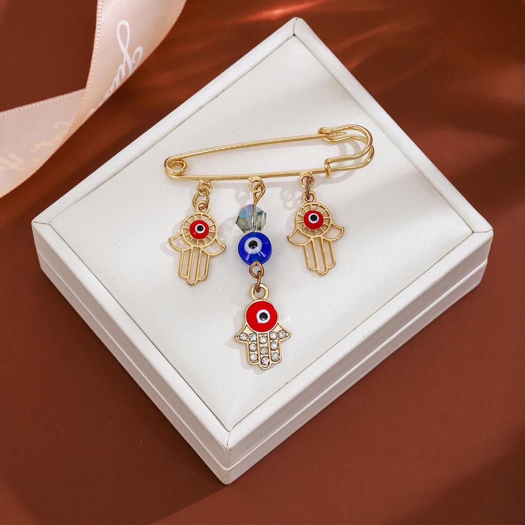 Creative Rhinestone Devil's Eye Tassel Brooch: Women's High-End Blue-Eyes Sweater Pin