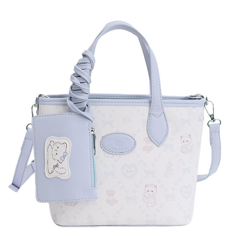 New versatile bucket bag women's high-end oblique span bag fashionable and simple commuter portable shoulder bag