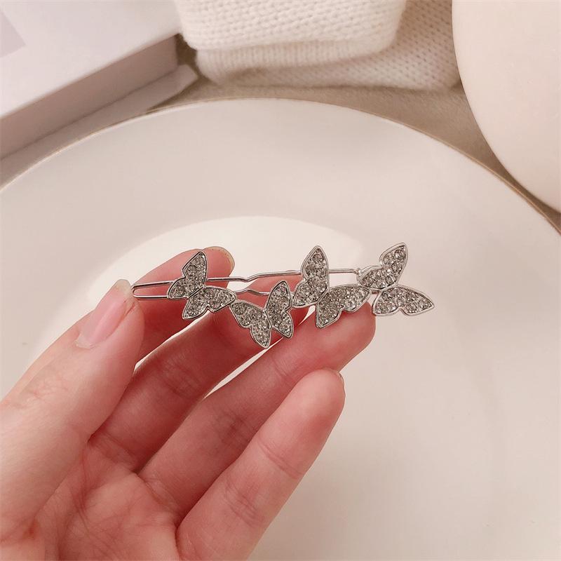 

Заколка для волос со стразами в форме бабочки — универсальный дизайн для женщин и девочек. Челки и боковые заколки.