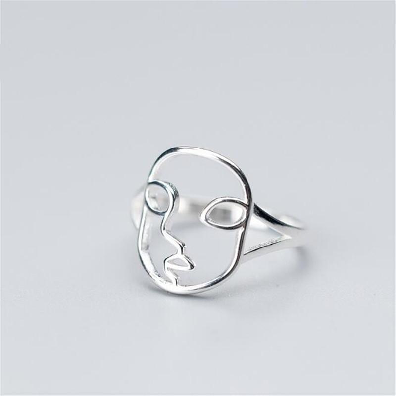 

New Creative Popular Hollow Face Shaped Fashion Jewelry 925 Sterling Silver Personality Delicate Asymmetric Opening Rings R256 серебряный