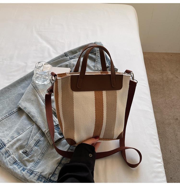 New Korean version retro handbag large simple striped canvas casual fashion large capacity shoulder commuter messenger bag