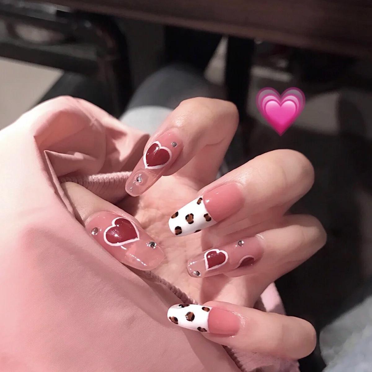 Ice-Transparent Nude Cow Print Love Heart False Nails - Waterproof, Removable, and Ready-to-Wear Nail Art Stickers.