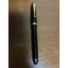 Used PILOT ballpoint pen, black, gold clip