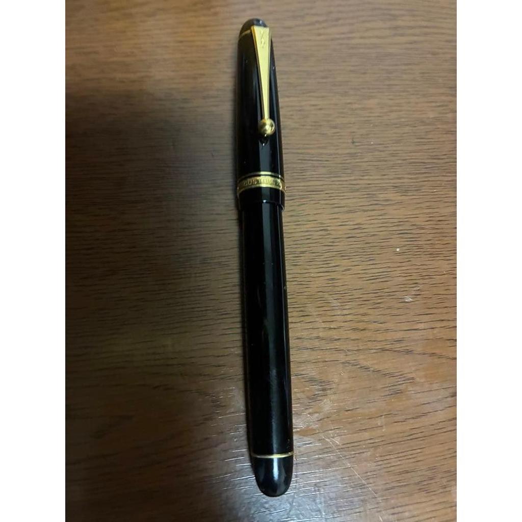 Used PILOT ballpoint pen, black, gold clip