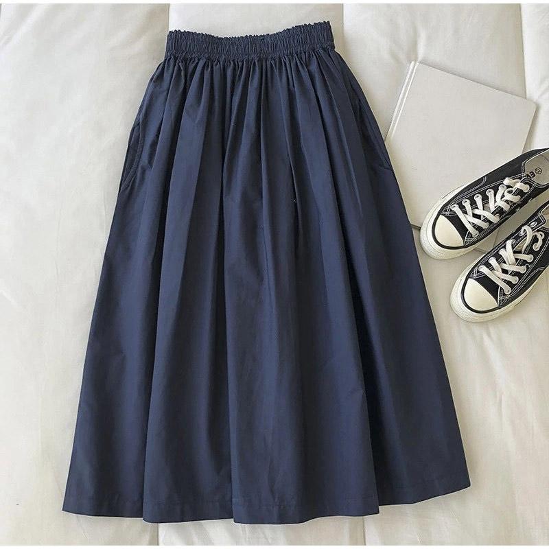 Модные женские юбки длиной до колен с карманами и складками — фото 4