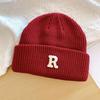 Hat winter female high-value round face student versatile cold-proof warm face small knitted wool hat