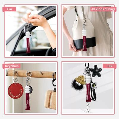 Porte-clés Pratique en Silicone en Forme de Donut, Accessoires de Capuchon, Porte-clés Portable et Durable, Compatible pour le Rangement de Gloss à Lèvres et Capuchon de Baume