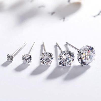 Beixi S999 Sterling Silver Four-Prong Stud Earrings for Women – Simple Korean Style, Elegant Light Luxury, Anti-Blockage Ear Care.