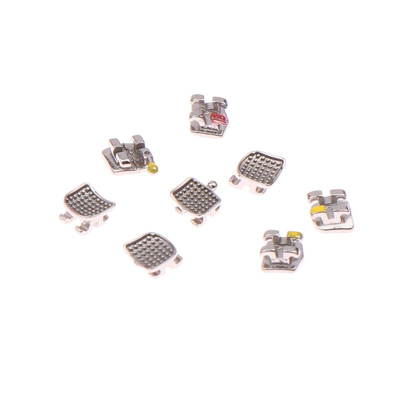 

20Pcs/Box Dental Metal Mini Bracket Straight Wire Bow Roth 0.022 Without Hooks Mini Braces Self- Ligating Dental Materials 20pcs