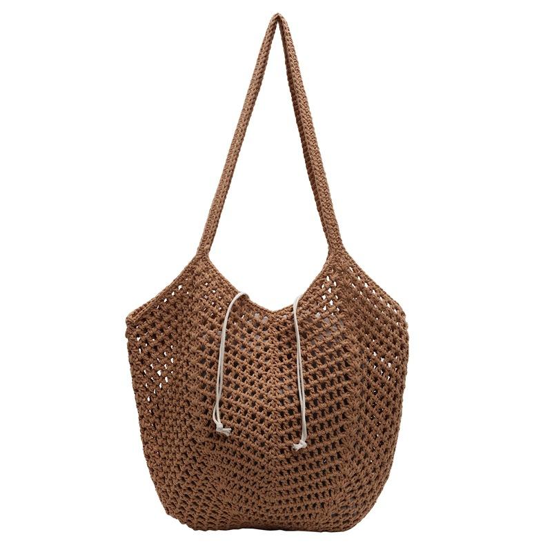 2025 spring and summer new hollow bucket bag shoulder woven bag large capacity tote bag fashionable beach women's bag
