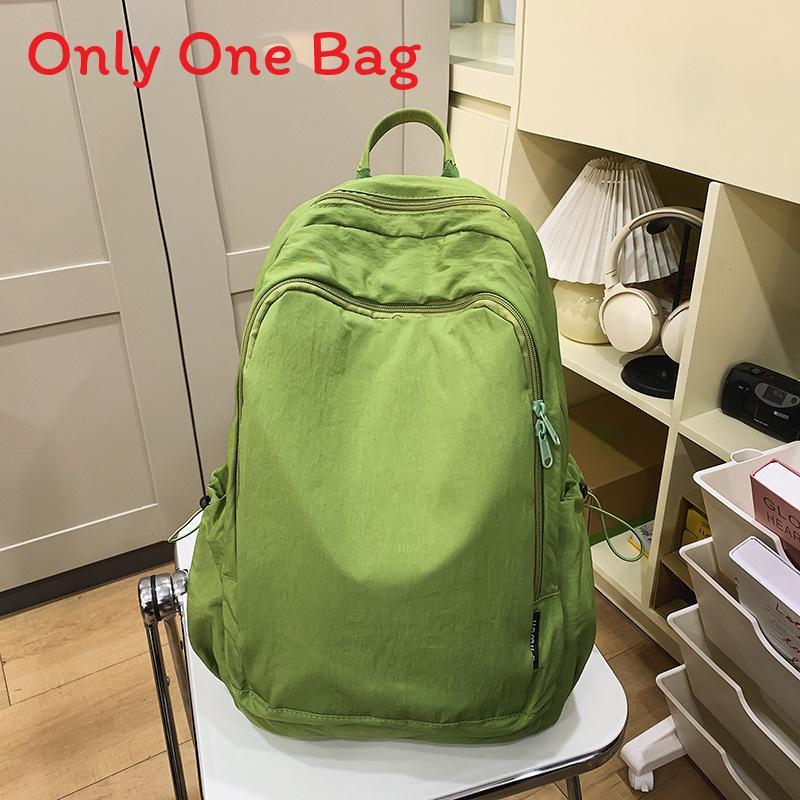 

Minimalist Nylon Backpack For Women And Men With Laptop Compartment For School And Travel зелений