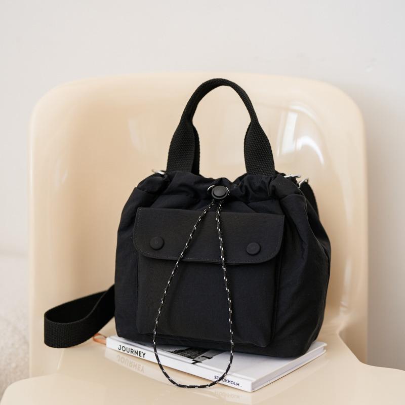 

Mini messenger bucket bag women s mobile phone bag simple and versatile Oxford cloth light hand carry shopping shoulder drawstring small bag