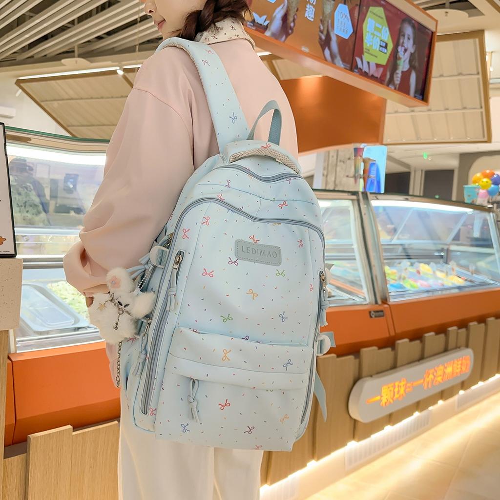Schoolbag Korean version ins Sweet colorful bow backpack Summer vitality full of soft waxy playful primary and secondary school backpack