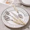 4-teiliges Set Keramik-Perlgriff-Besteck Messer, Gabel, Löffel, kreativer Speiselöffel, Western-Stil Steakmesser- und Gabelset