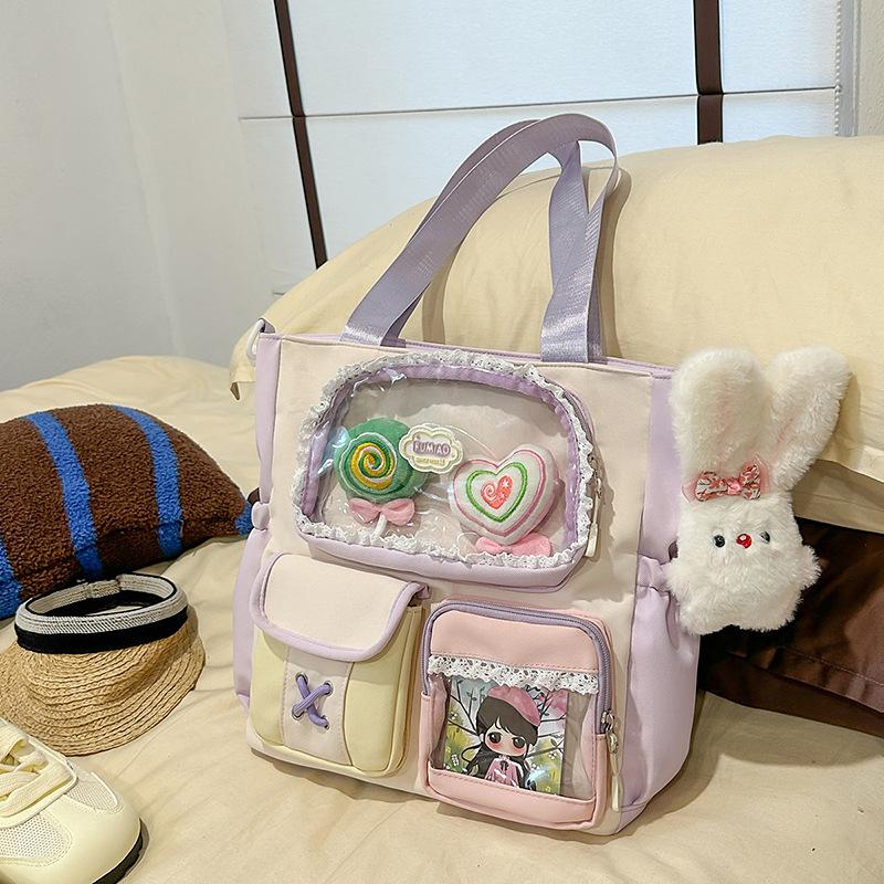 High value dopamine sweet contrasting color girl heart backpack college wind junior high school students multi-compartment backpack